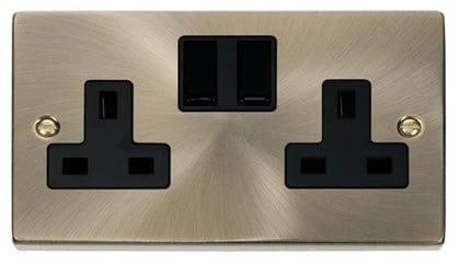 Antique Brass - Black Inserts Antique Brass 2 Gang 13A Twin Double Switched Plug Socket - Black Trim