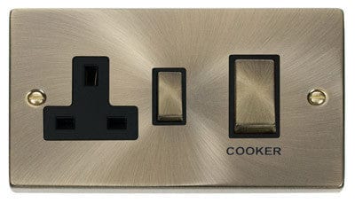 Antique Brass - Black Inserts Antique Brass Cooker Control Ingot 45A With 13A Switched Plug Socket - Black Trim