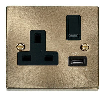 Antique Brass - Black Inserts Antique Brass 1 Gang 13A DP 1 USB Switched Plug Socket - Black Trim