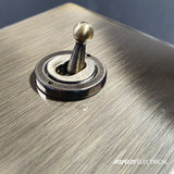 Screwless Antique Brass - Black Trim - Slim Plate Screwless Antique Brass 13A 2  Gang Euromod Floor Plug Socket